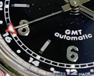 Analog watch with GMT hand